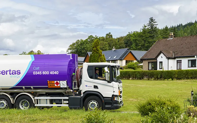 Certas Energy oil tanker outside a domestic home.